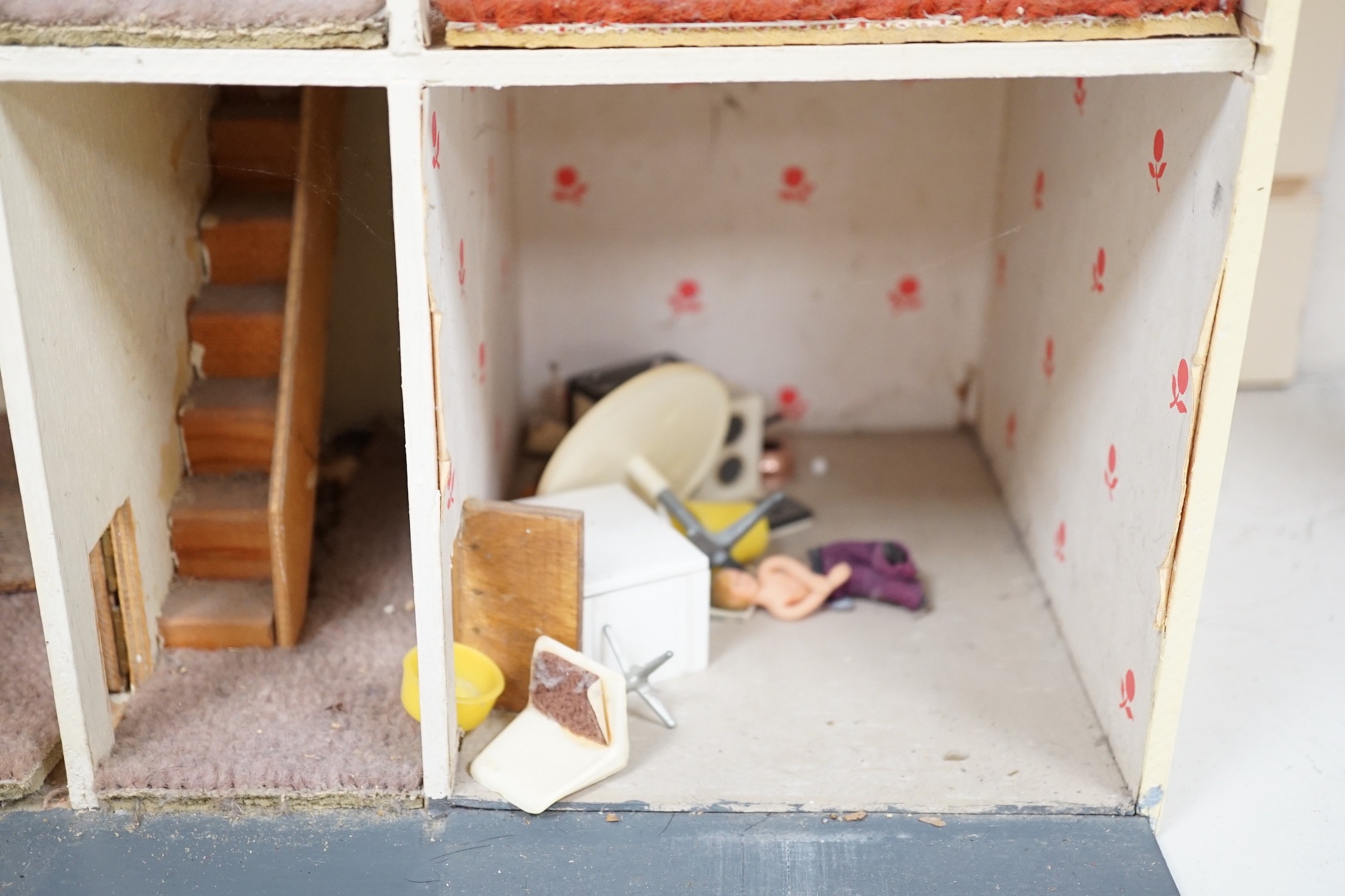 A doll's house based on a Georgian Bath townhouse, with contents, 43cm wide, 71cm high